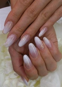 white-ombre-nails-with-gold-glitter-new-years-eve-nail-art