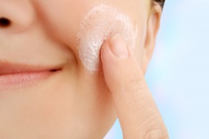 woman-exfoliating-skin