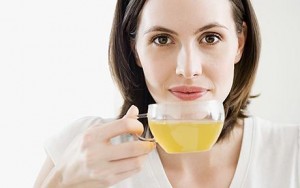 Woman drinking green tea