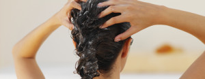 Rear view of a woman washing her hair